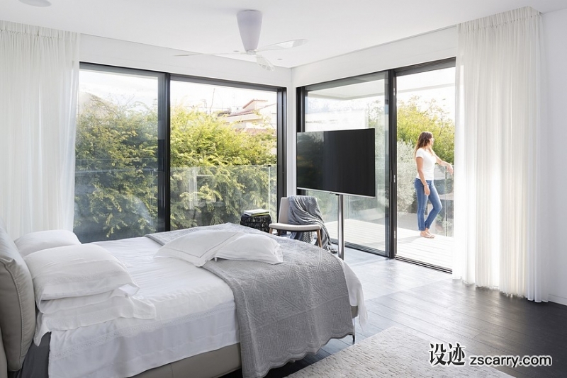 L-Shaped-Home-Organized-Around-a-Central-Steel-Staircase-13.jpg 家装参考,卧室,现代风格,