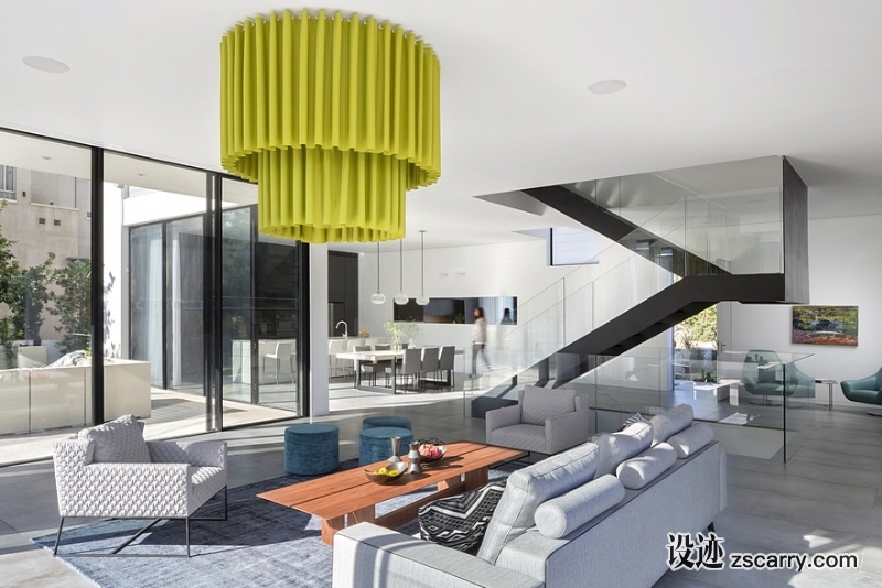 L-Shaped-Home-Organized-Around-a-Central-Steel-Staircase-11.jpg 软装参考,客厅搭配,现代气氛,