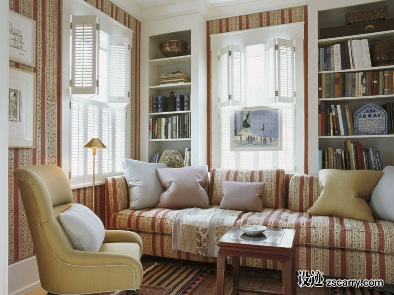 09-The+striped+wall+covering+by+Robert+Kime+matches+the+sofa,+which+doubles+the+size+of+this+small+library.+.jpg 软装参考,客厅搭配,简欧气氛,