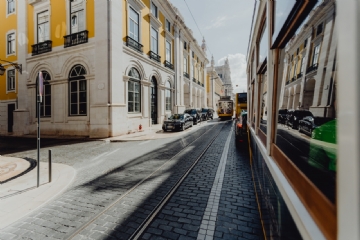 灰色 kaboompics_Famous vintage yellow 28 tram on street of Lisbon, Portugal-2.jpg